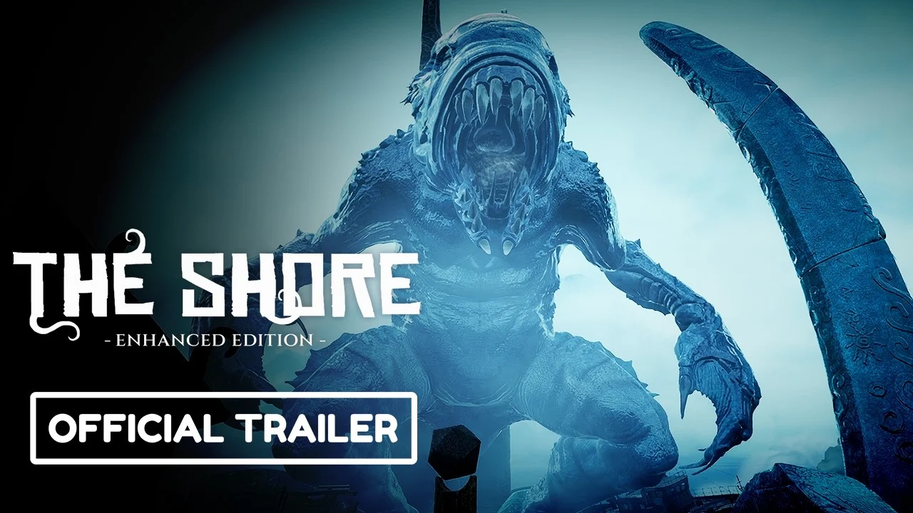 Bluish alien creature with a gaping jaw looming over ruins; includes 'The Shore Enhanced Edition' and an 'Official Trailer' banner (promo header).