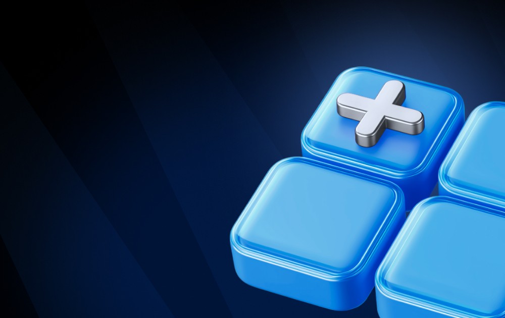 Blue glossy 3D squares arranged in a grid with a silver plus sign on the top-right tile on a dark gradient background