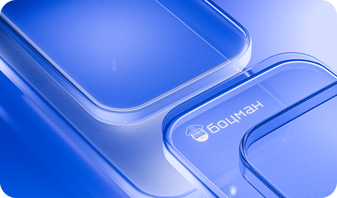 Close-up of a blue, glassy smartphone or device with rounded corners; the brand name 'Боцман' is visible on the surface.