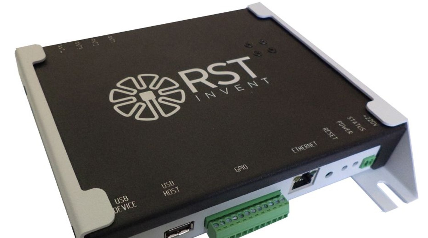 RST Invent industrial controller module with Ethernet port, USB and GPIO terminals, mounted in a metal chassis.