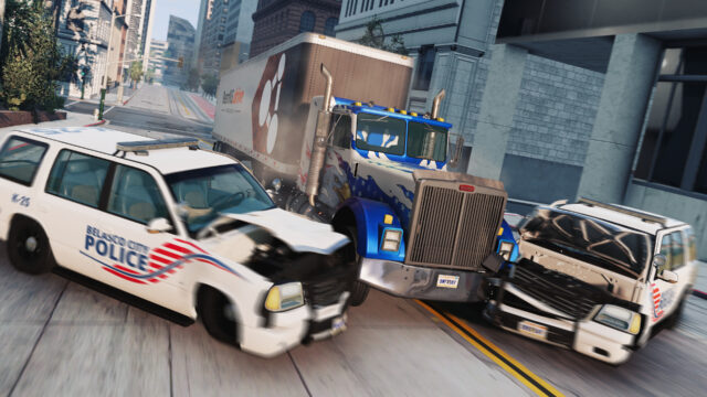 Semi truck and two Belasco City police SUVs with crushed fronts after a crash on a city street
